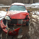 Illustration for article titled You Havent Reached Rock Bottom Until Youve Got A Totaled Kia Rio Stuck In Your Backyard